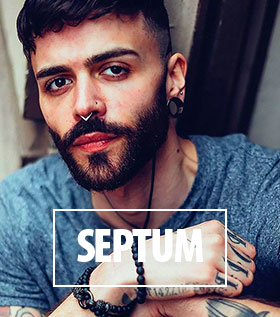 Cool young man with septum piercing